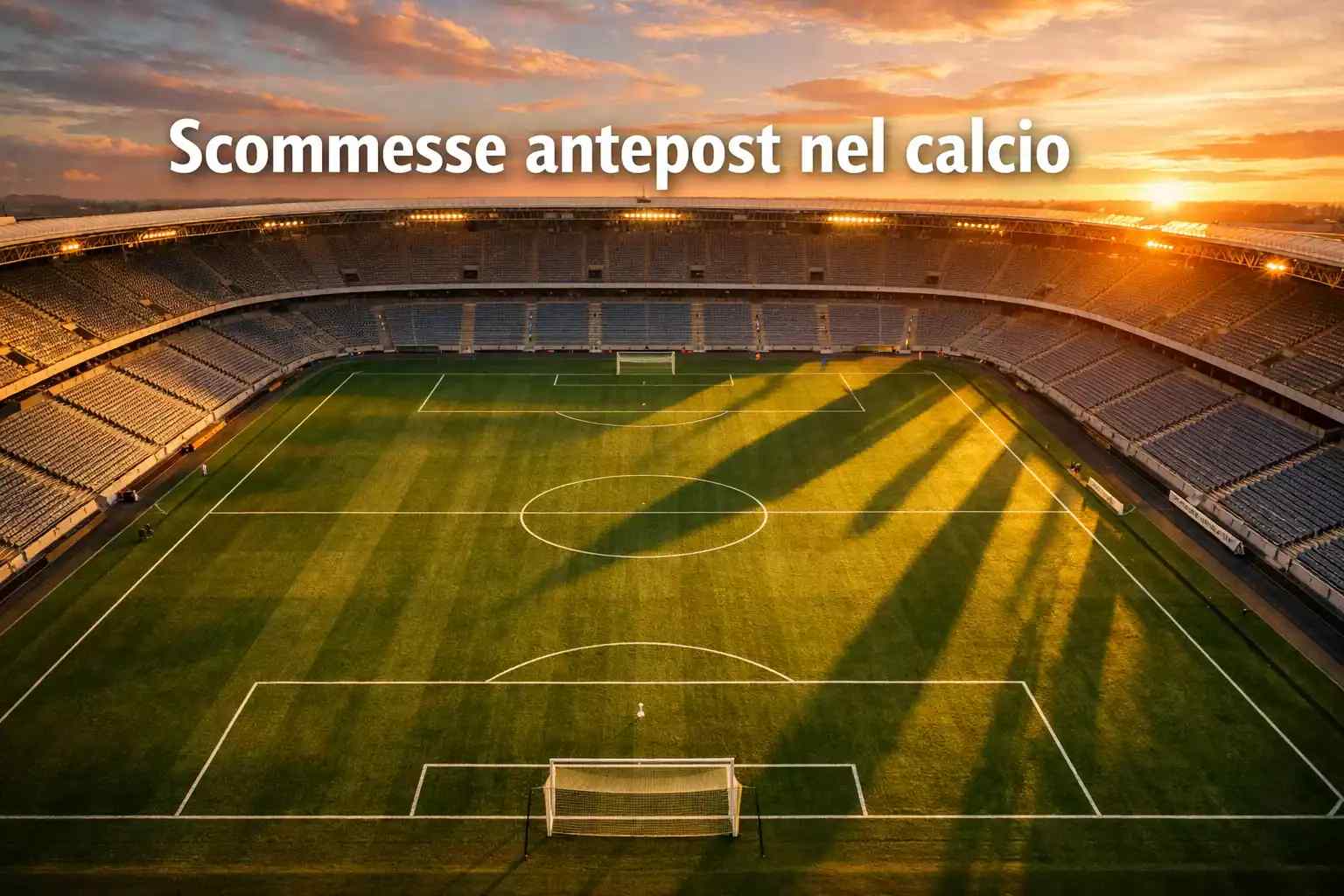 Campo di calcio in erba visto dall'alto con le linee bianche al tramonto